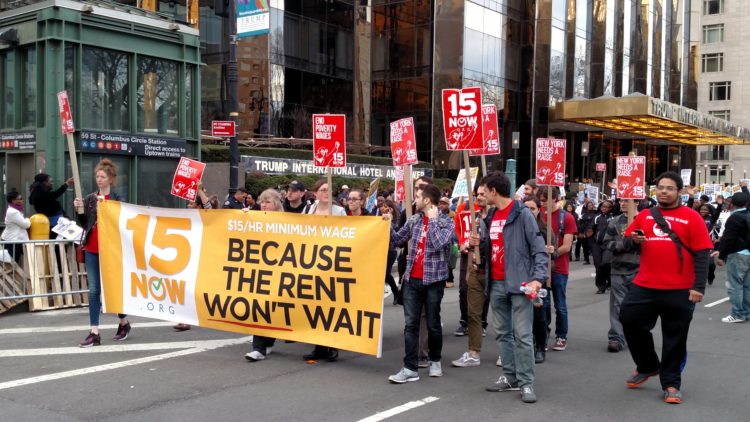 Protesters in support of a $15 federal minimum wage at a NYC rally