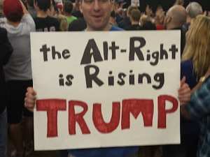 A member of the Alt RIght holds a Trump sign at a rally. (Source: Jesse Walker)