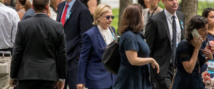 Hillary Clinton leaving the 9/11 Memorial event. (Source: Andrew Harnik/ AP Photo)