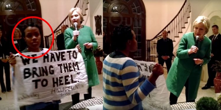 A Black Lives Matter protester interrupts Hillary Clinton's fundraising event in Charleston, South Carolina.