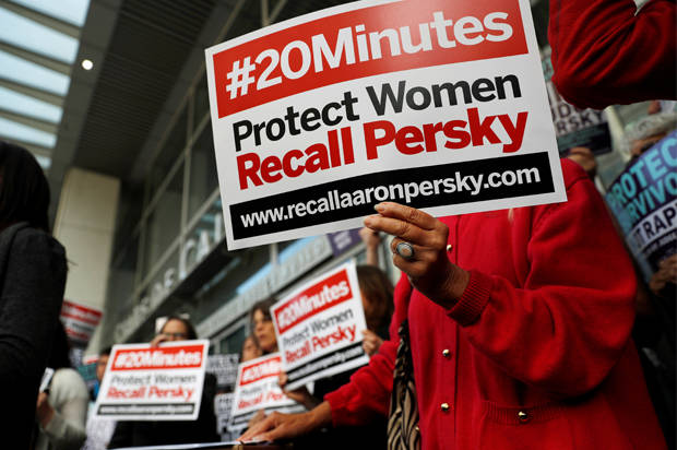 Protestors and activists with signs that read “#20Minutes”, referring to the letter released by Brock Turner’s father that referred to his son’s sexual assault. Many felt that Judge Persky should have been recalled based on his decision for the verdict. (Credit: Reuters/Stephen Lam)
