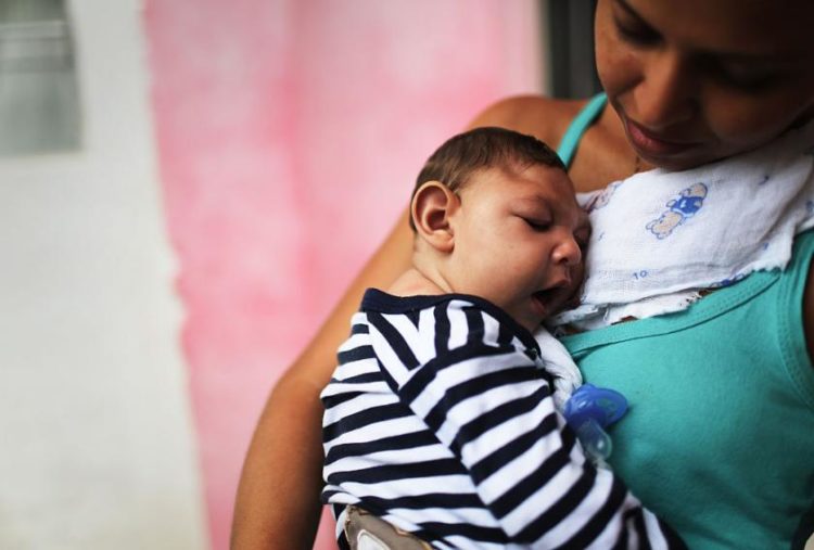 Daniele Santos (mother) holds her baby Juan Pedro, who has microcephaly, in Recife, Brazil. Mario Tama/Getty Images